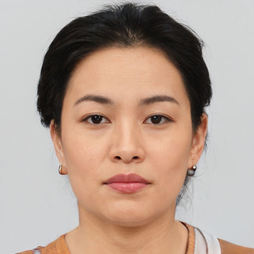 Neutral asian young-adult female with medium  brown hair and brown eyes