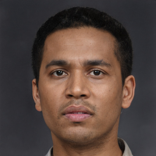 Neutral latino young-adult male with short  black hair and brown eyes