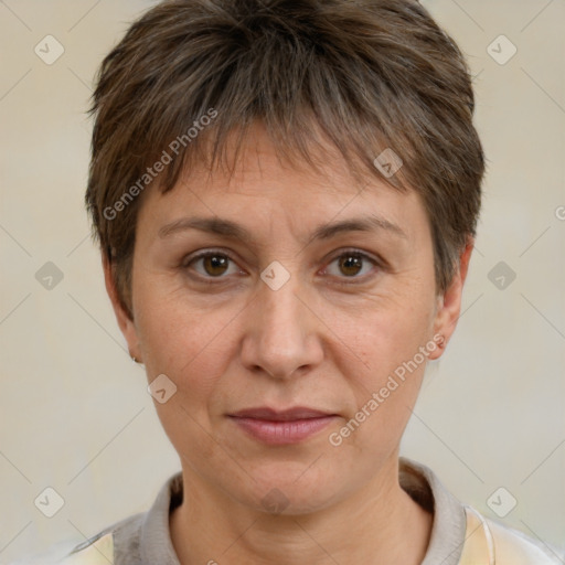 Joyful white adult female with short  brown hair and brown eyes