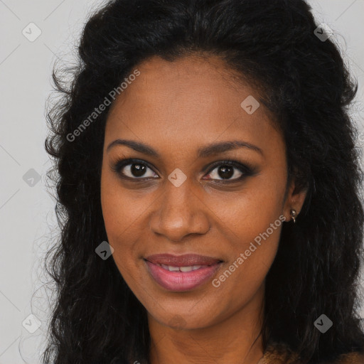 Joyful black young-adult female with long  brown hair and brown eyes