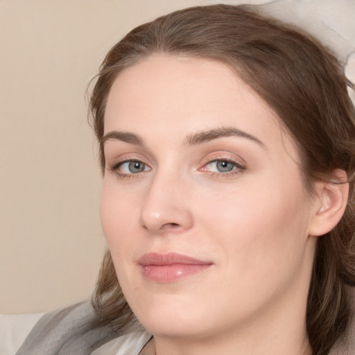 Neutral white young-adult female with medium  brown hair and grey eyes