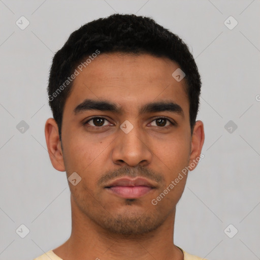 Neutral latino young-adult male with short  black hair and brown eyes