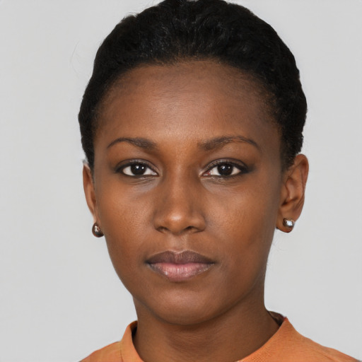 Neutral black young-adult female with short  black hair and brown eyes