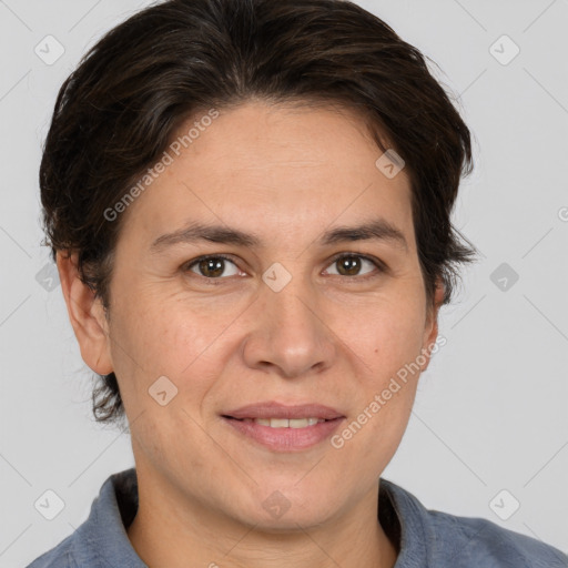 Joyful white adult female with short  brown hair and brown eyes