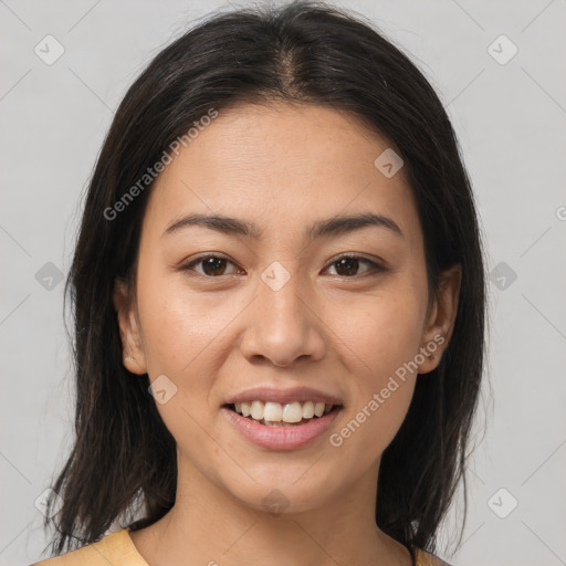 Joyful latino young-adult female with medium  brown hair and brown eyes