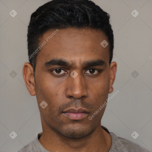 Neutral black young-adult male with short  black hair and brown eyes