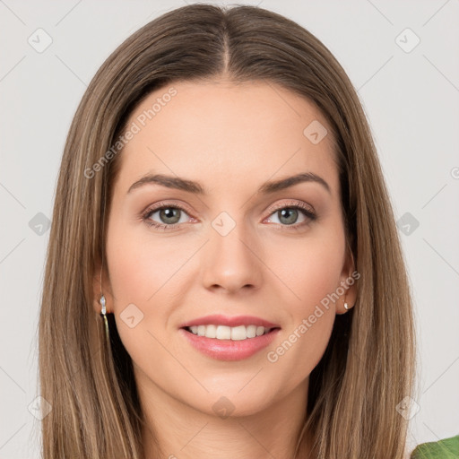 Joyful white young-adult female with long  brown hair and green eyes