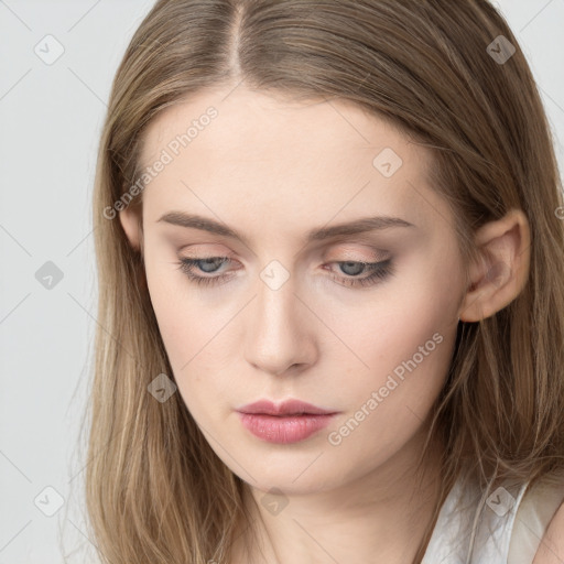 Neutral white young-adult female with long  brown hair and brown eyes