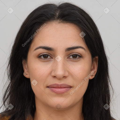 Joyful latino young-adult female with long  brown hair and brown eyes