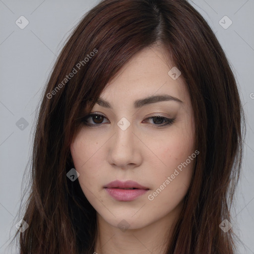 Neutral white young-adult female with long  brown hair and brown eyes