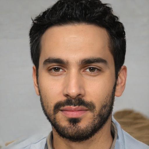 Neutral white young-adult male with short  black hair and brown eyes