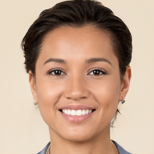 Joyful white young-adult female with medium  brown hair and brown eyes