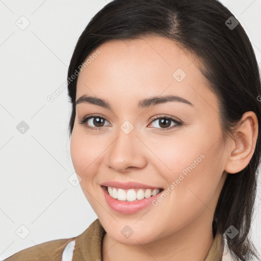 Joyful white young-adult female with long  brown hair and brown eyes