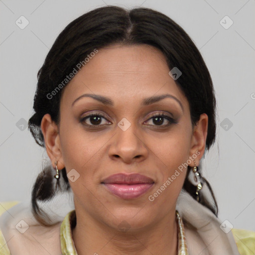 Joyful black adult female with medium  brown hair and brown eyes