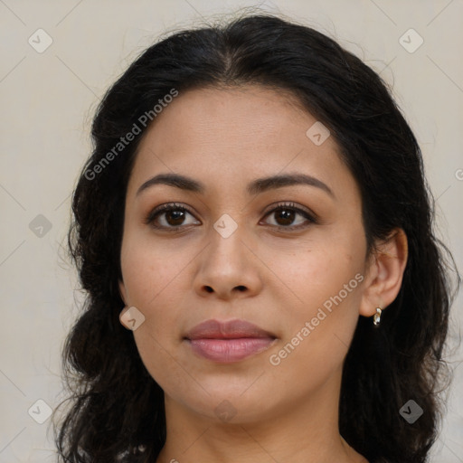 Joyful latino young-adult female with long  brown hair and brown eyes