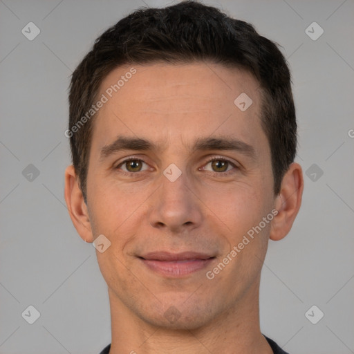 Joyful white adult male with short  brown hair and brown eyes