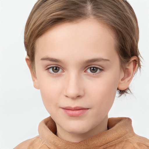 Joyful white child female with short  brown hair and brown eyes