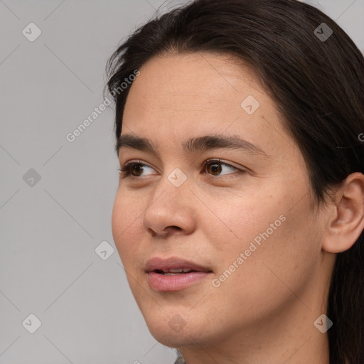 Joyful white young-adult female with long  brown hair and brown eyes