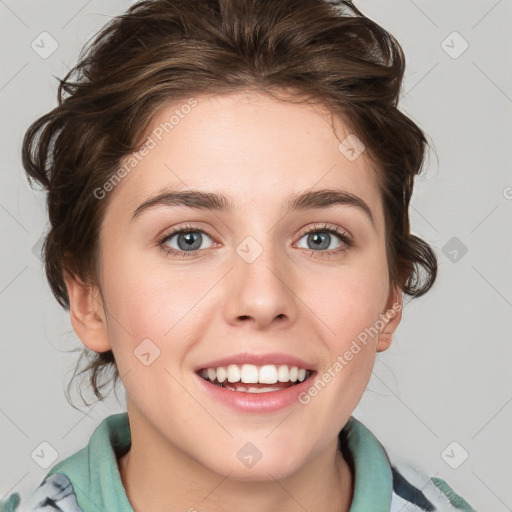 Joyful white young-adult female with medium  brown hair and green eyes