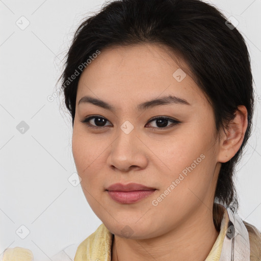 Joyful latino young-adult female with medium  brown hair and brown eyes