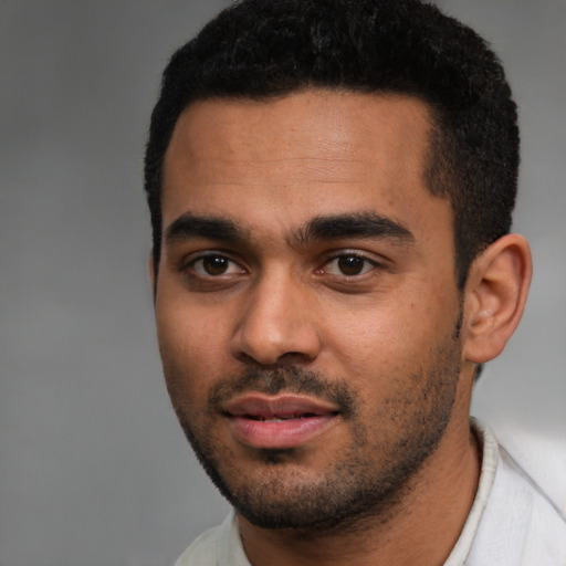 Neutral black young-adult male with short  black hair and brown eyes