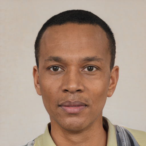 Neutral latino adult male with short  black hair and brown eyes