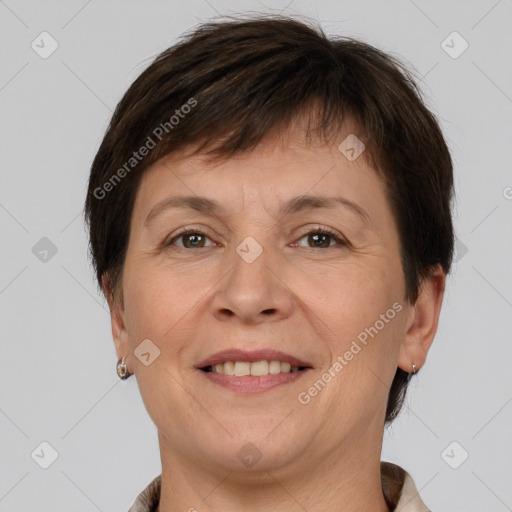 Joyful white adult female with short  brown hair and brown eyes