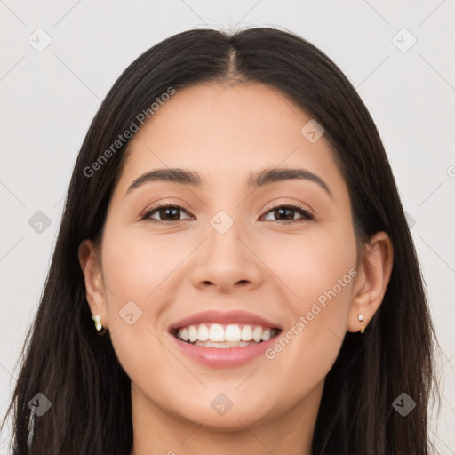 Joyful asian young-adult female with long  brown hair and brown eyes