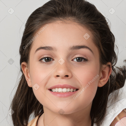 Joyful white child female with medium  brown hair and brown eyes