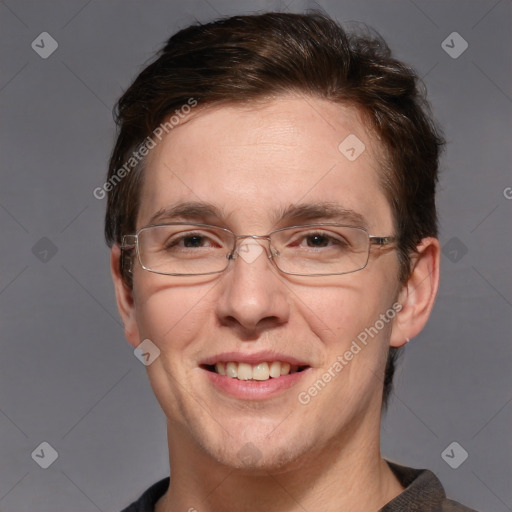 Joyful white adult male with short  brown hair and grey eyes