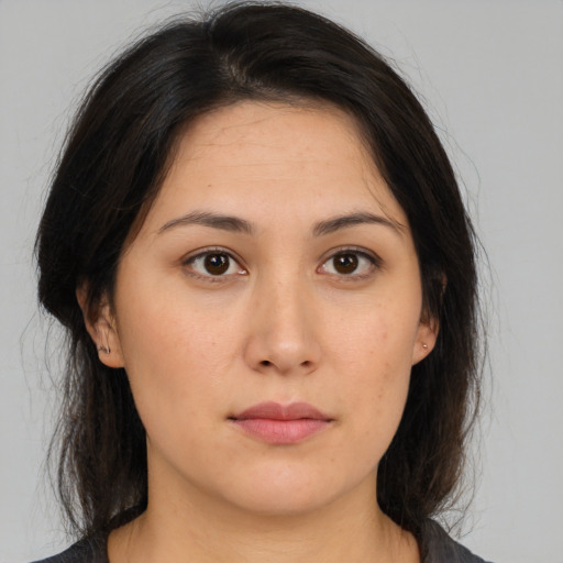 Neutral asian young-adult female with medium  brown hair and brown eyes