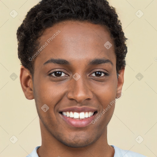 Joyful black young-adult male with short  brown hair and brown eyes