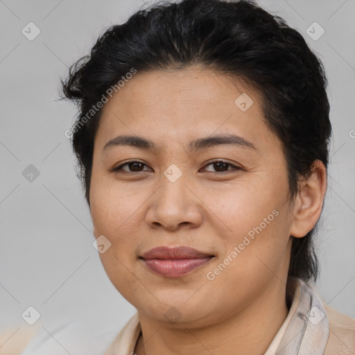 Joyful latino young-adult female with short  brown hair and brown eyes