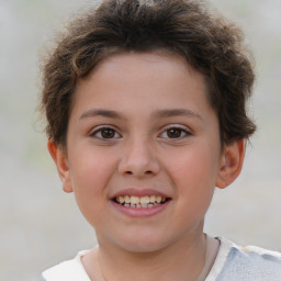 Joyful white child male with short  brown hair and brown eyes