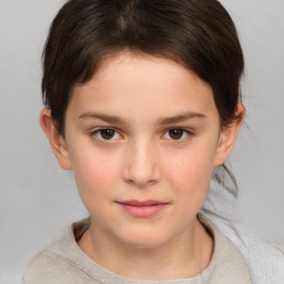 Joyful white child female with short  brown hair and brown eyes