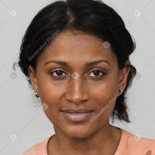 Joyful black young-adult female with medium  brown hair and brown eyes