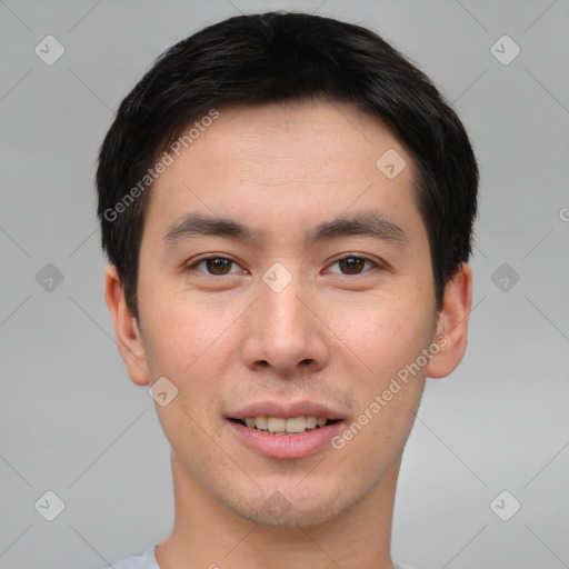 Joyful asian young-adult male with short  brown hair and brown eyes