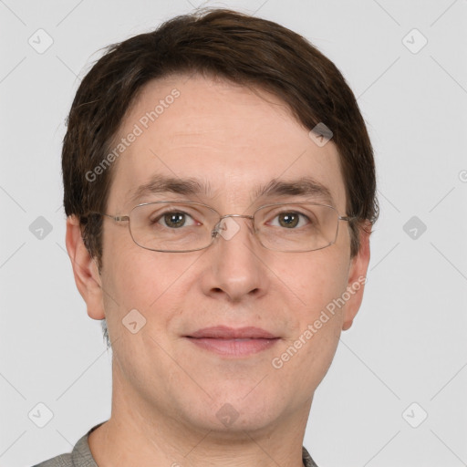 Joyful white adult male with short  brown hair and grey eyes