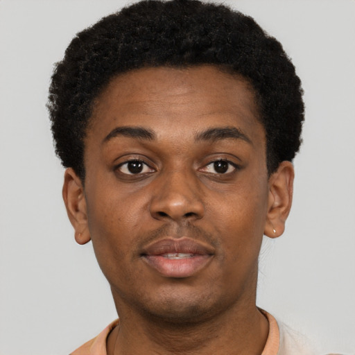 Neutral black young-adult male with short  brown hair and brown eyes