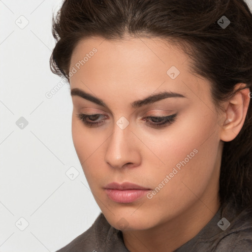 Neutral white young-adult female with long  brown hair and brown eyes