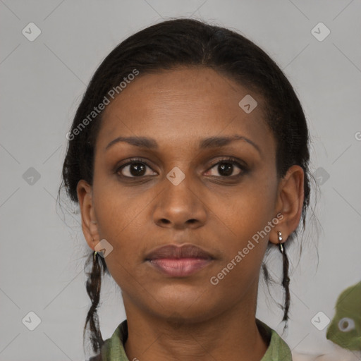 Neutral black young-adult female with medium  brown hair and brown eyes