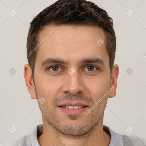 Joyful white young-adult male with short  brown hair and brown eyes