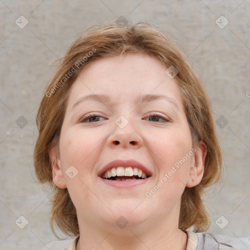 Joyful white young-adult female with medium  brown hair and blue eyes