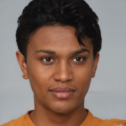 Neutral black young-adult female with short  brown hair and brown eyes