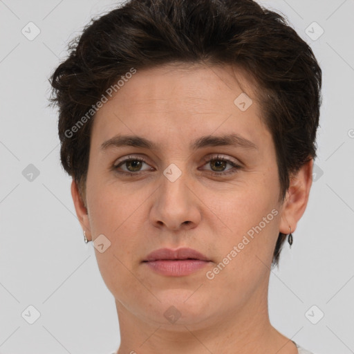 Joyful white adult female with short  brown hair and brown eyes