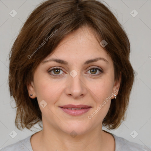 Joyful white young-adult female with medium  brown hair and green eyes