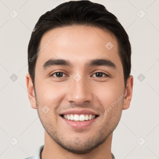 Joyful white young-adult male with short  brown hair and brown eyes