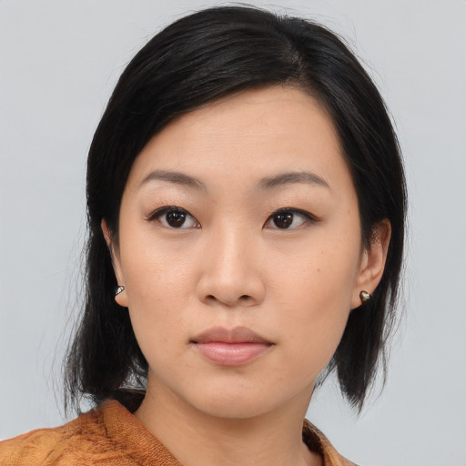 Neutral asian young-adult female with medium  black hair and brown eyes