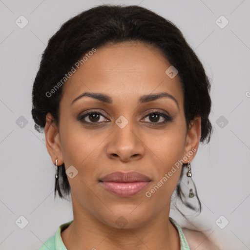 Joyful black young-adult female with short  brown hair and brown eyes