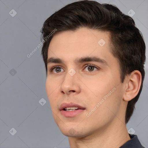 Neutral white young-adult male with short  brown hair and brown eyes